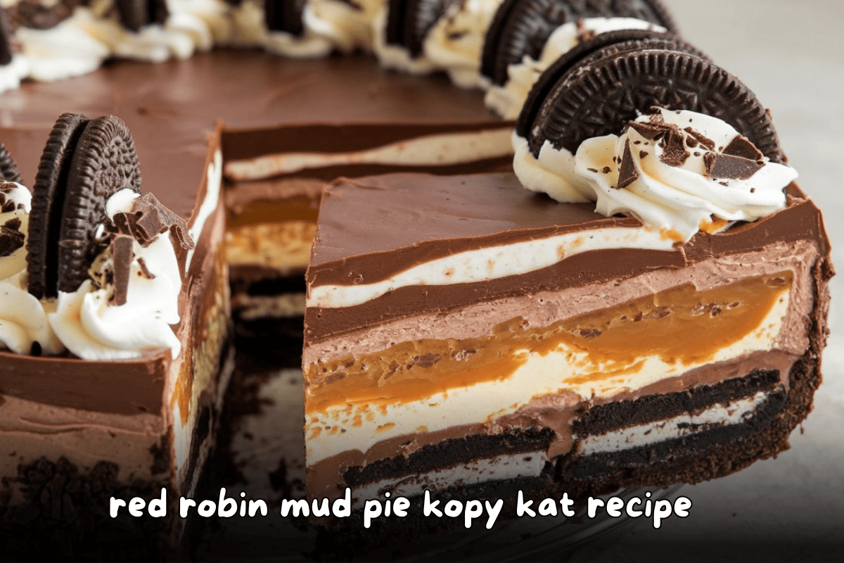 Decadent Red Robin Mud Pie with layers of chocolate ice cream, caramel, and Oreo cookie crust topped with whipped cream and Oreo cookies