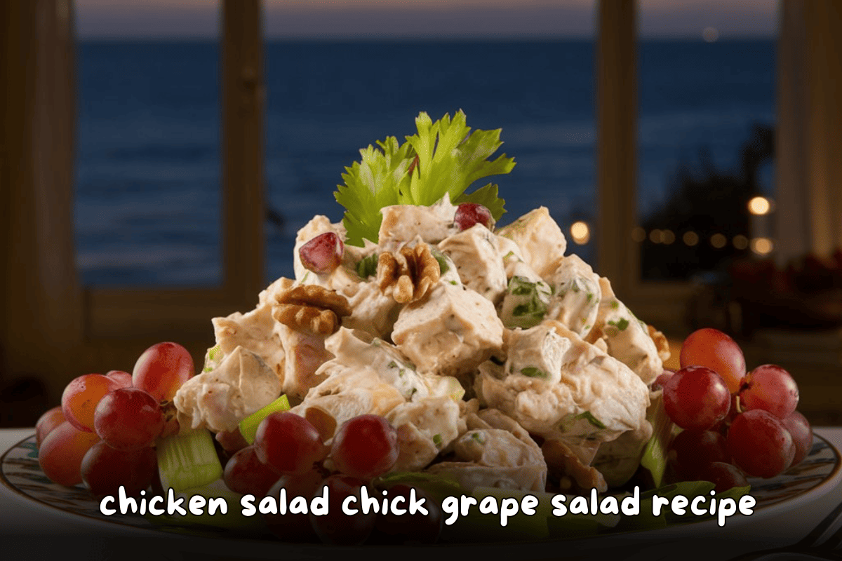 Chicken Salad Chick Grape Salad with a side of fresh grapes, topped with crunchy pecans, and served with a garnish of celery.